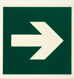 white and green arrow sign
